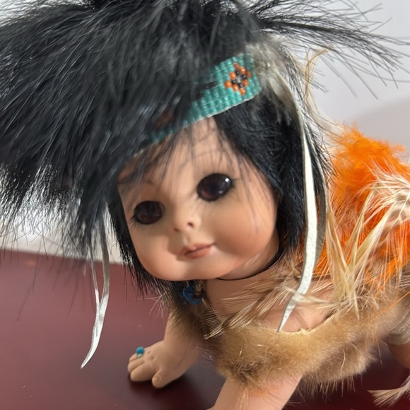 Highly Collectable Native American Crawling Baby Porcelain Doll with Feathers - Picture 2 of 8